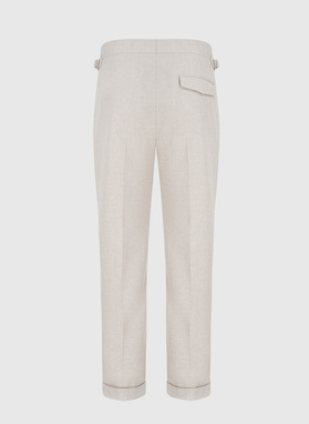 Męskie spodnie w kolorze beżowym w jodełkę