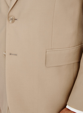 Beżowy wełniany garnitur męski