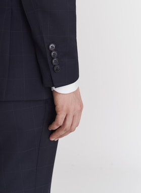 Granatowy garnitur dwurzędowy w subtelną kratę