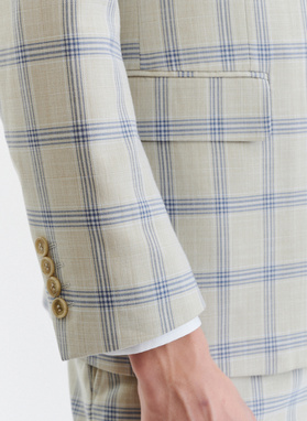 Beżowy garnitur w niebieską kratę