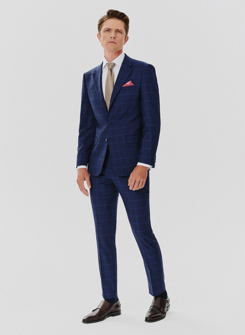 Dwuczęściowy granatowy garnitur męski w niebieską kratę