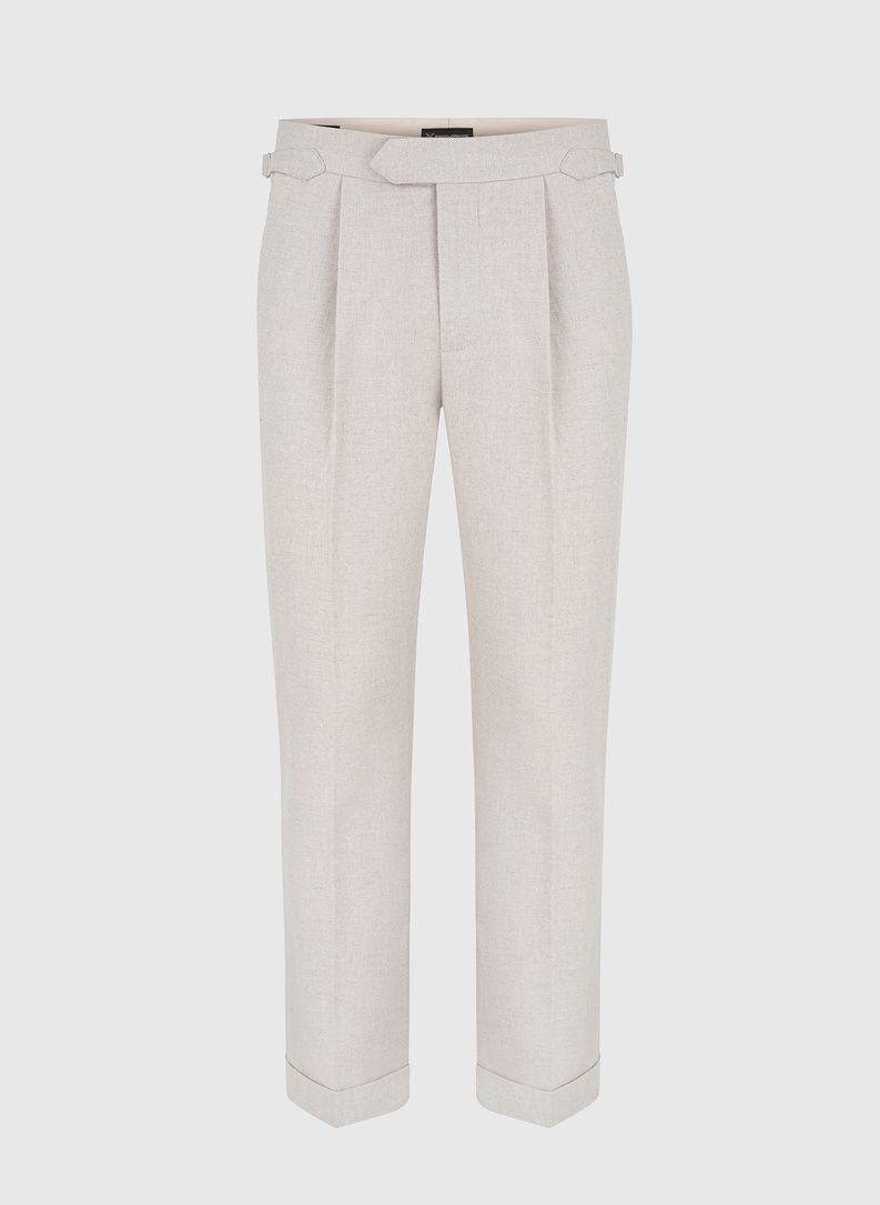 Męskie spodnie w kolorze beżowym w jodełkę