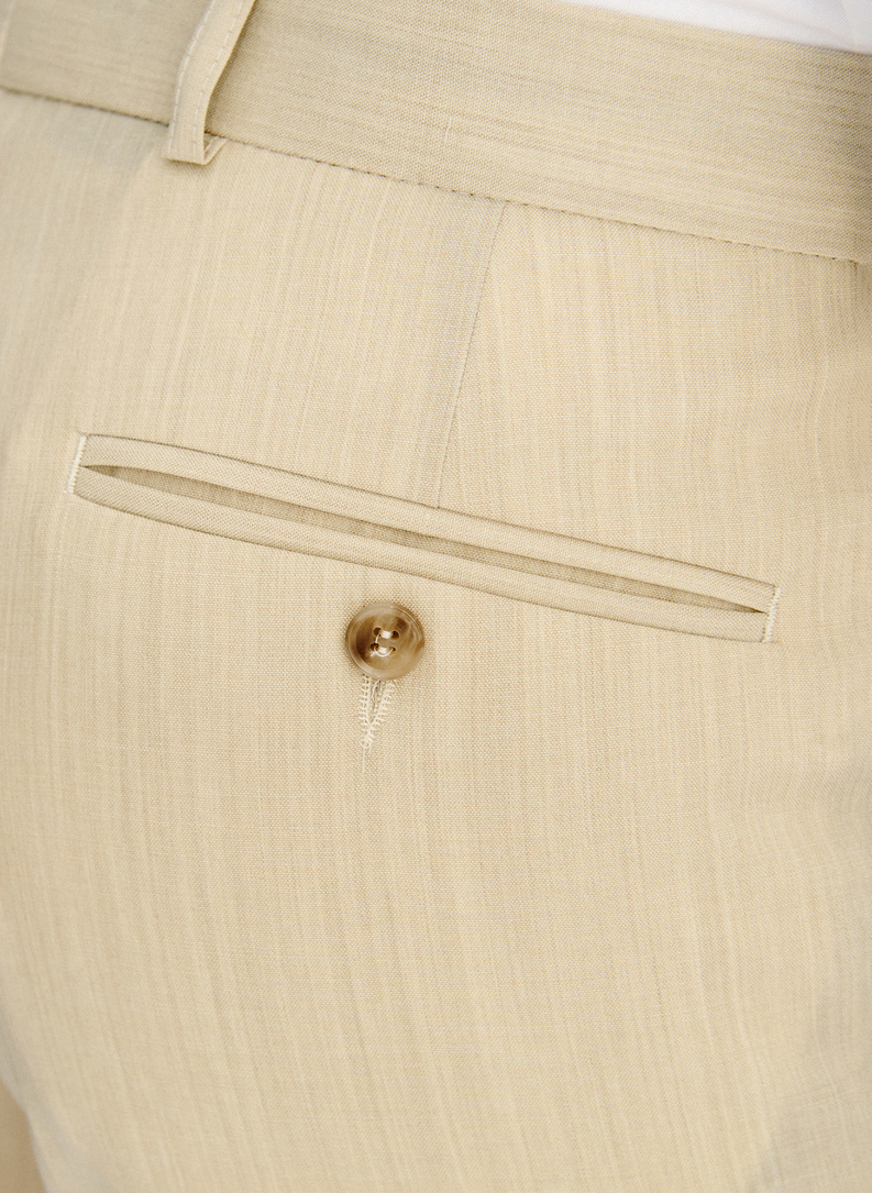 Beżowy wełniany garnitur męski