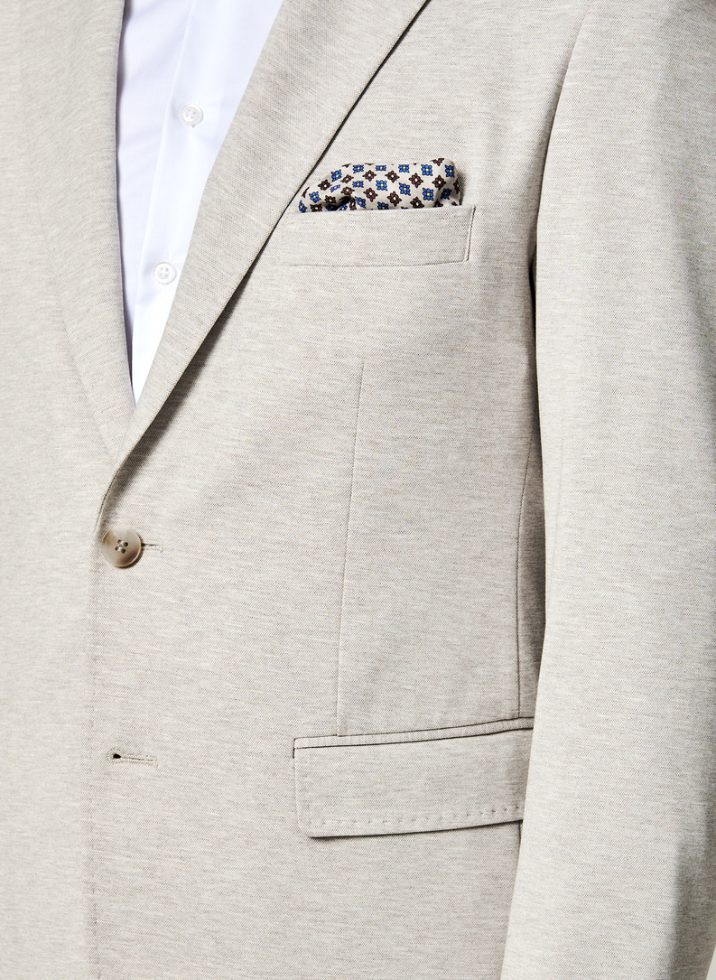 Dzianinowa marynarka w kolorze beżowym