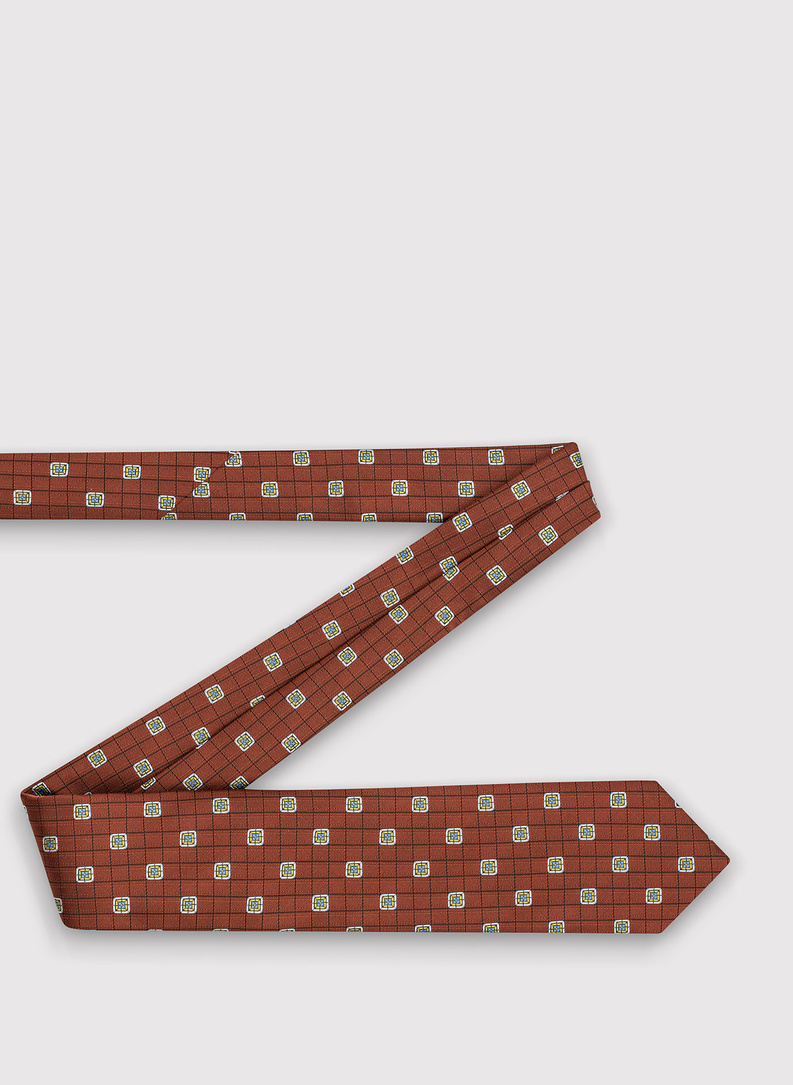 Rudy krawat męski w geometryczny wzór
