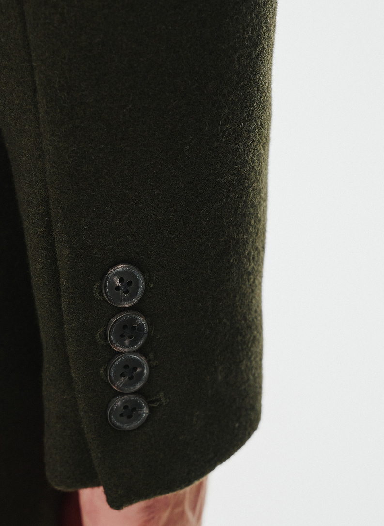 Wełniany płaszcz męski w kolorze zielonym