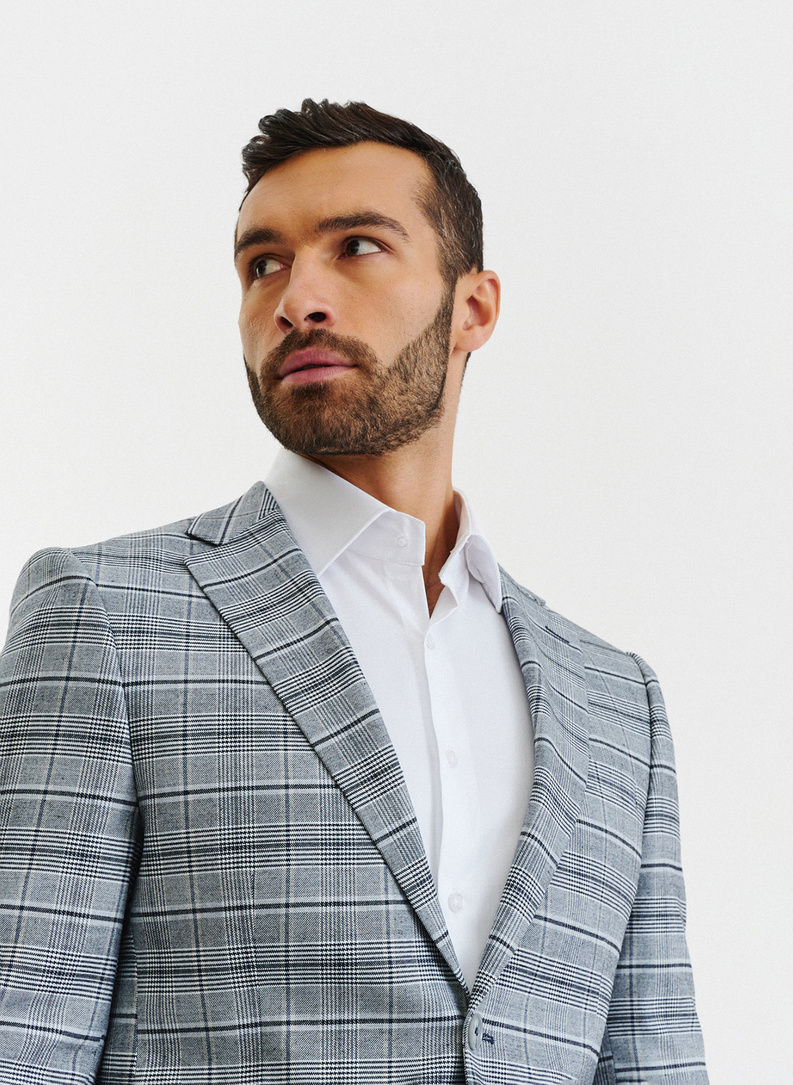 Szary kraciasty garnitur męski