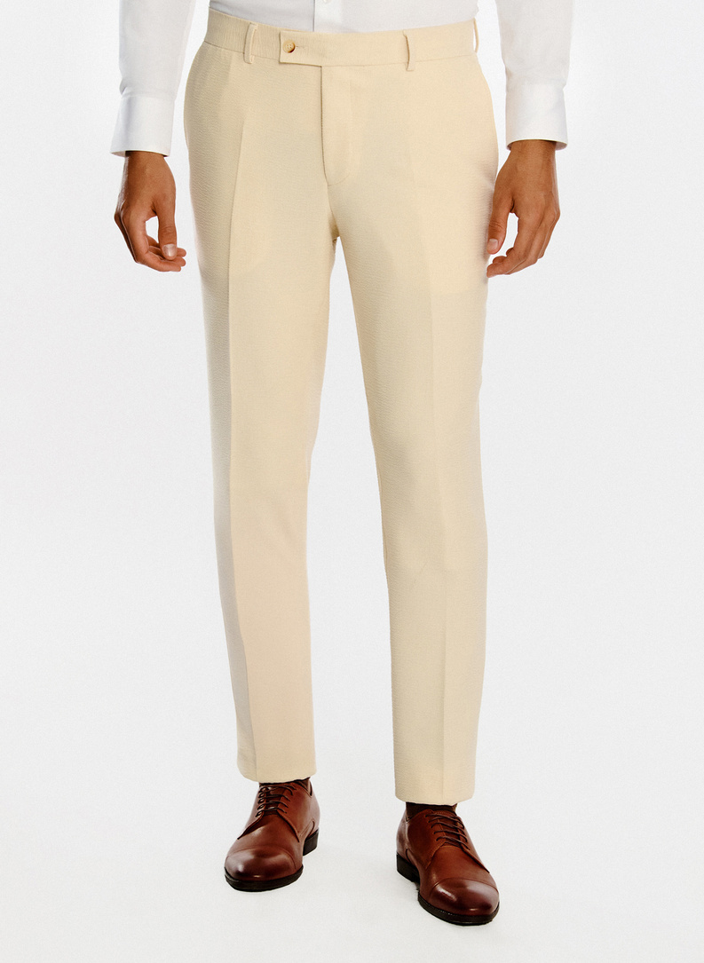 Jasnobeżowe spodnie garniturowe