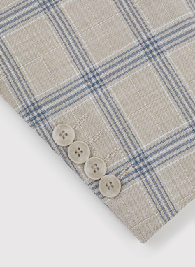 Beżowy garnitur w niebieską kratę