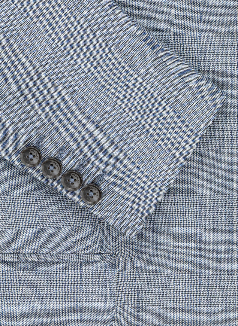 Dwuczęściowy niebieski garnitur męski w kraciasty deseń