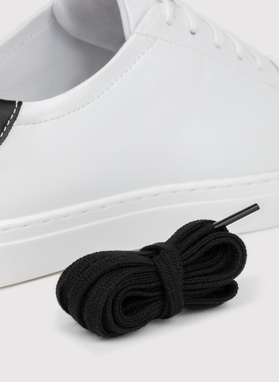 Skórzane białe sneakersy męskie z czarną wstawką