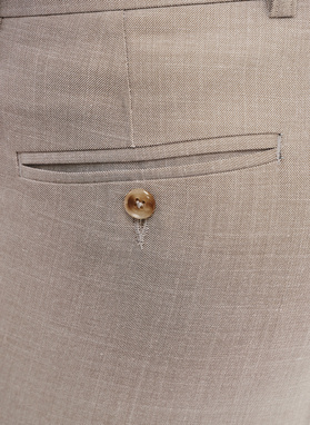 Spodnie garniturowe w kolorze beżowym