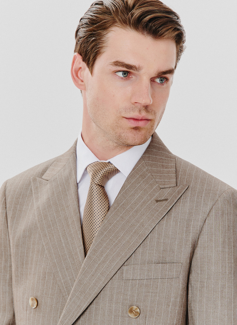 Beżowa marynarka garniturowa w prążki