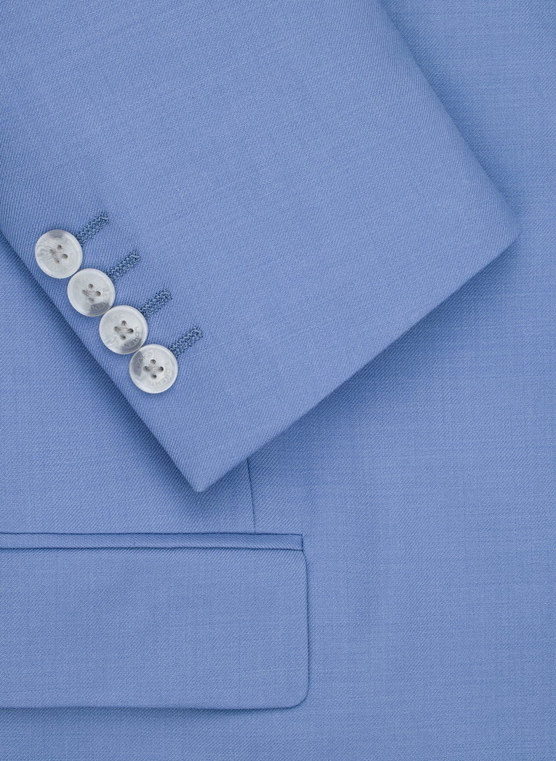 Niebieski wełniany garnitur męski