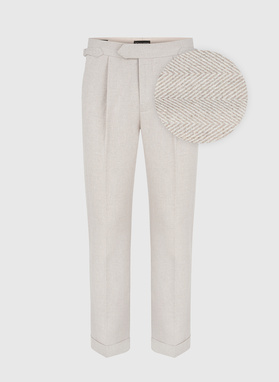 Męskie spodnie w kolorze beżowym w jodełkę