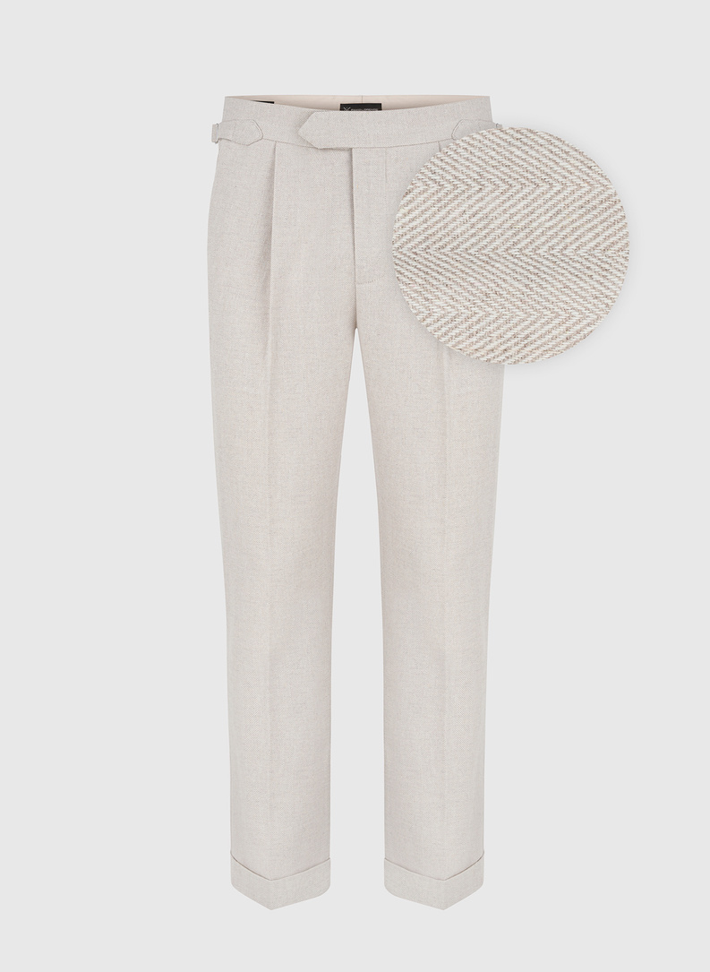 Męskie spodnie w kolorze beżowym w jodełkę