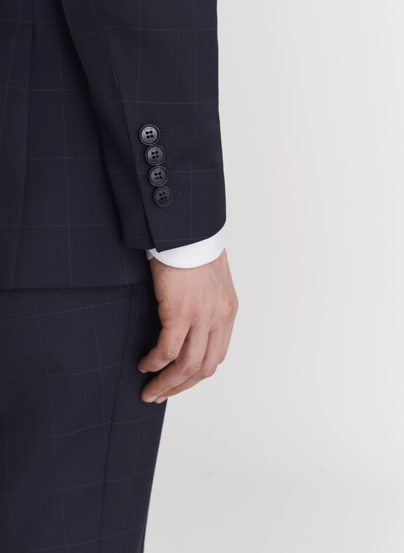 Granatowy garnitur dwurzędowy w subtelną kratę