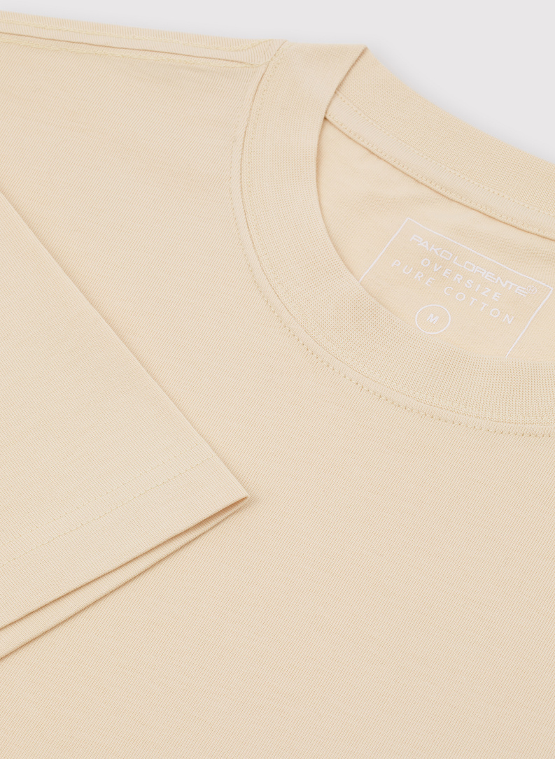 Beżowy t-shirt oversize