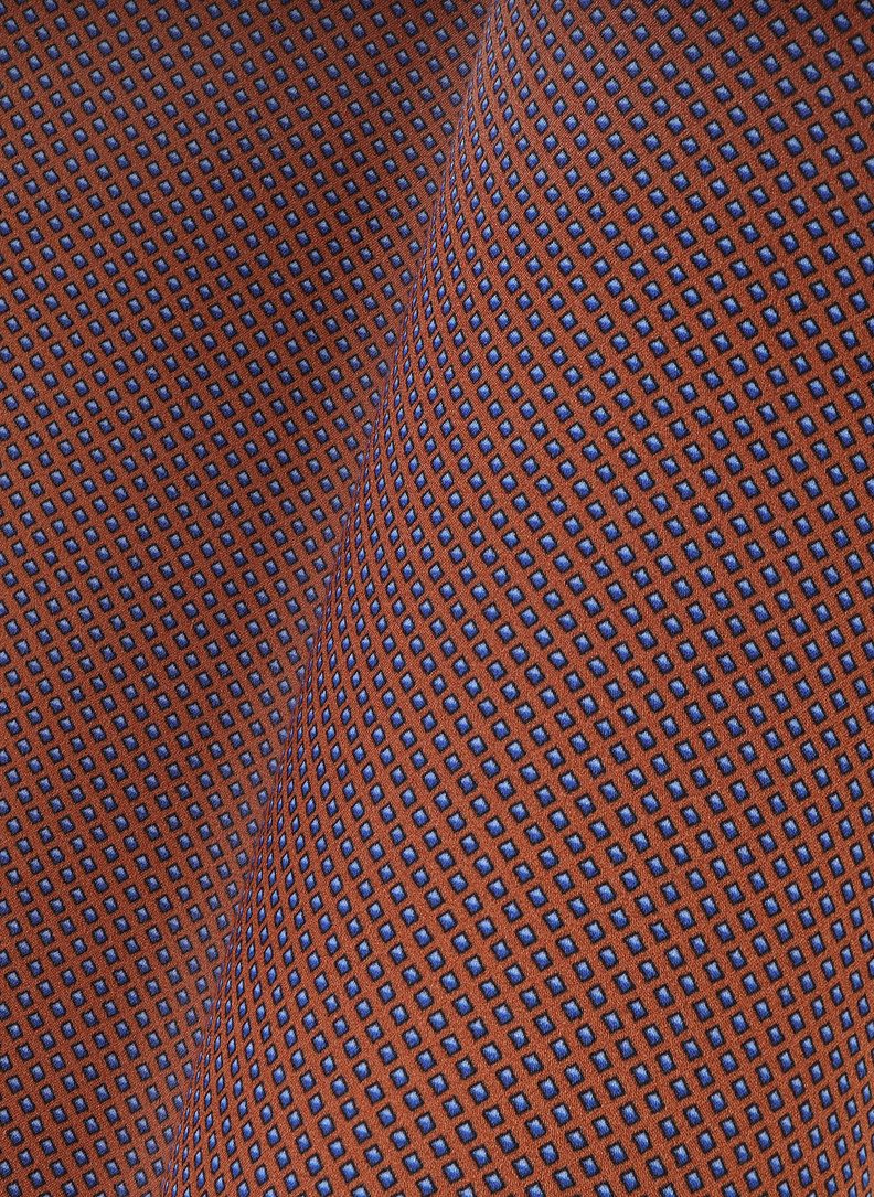 Pomarańczowa poszetka w drobny wzór