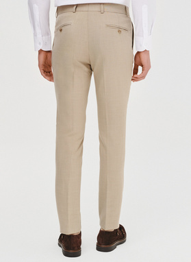 Beżowe spodnie ganiturowe