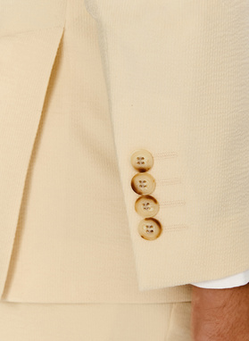 Jasnobeżowa marynarka garniturowa