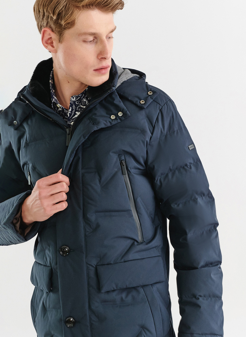 Granatowa pikowana kurtka z kapturem