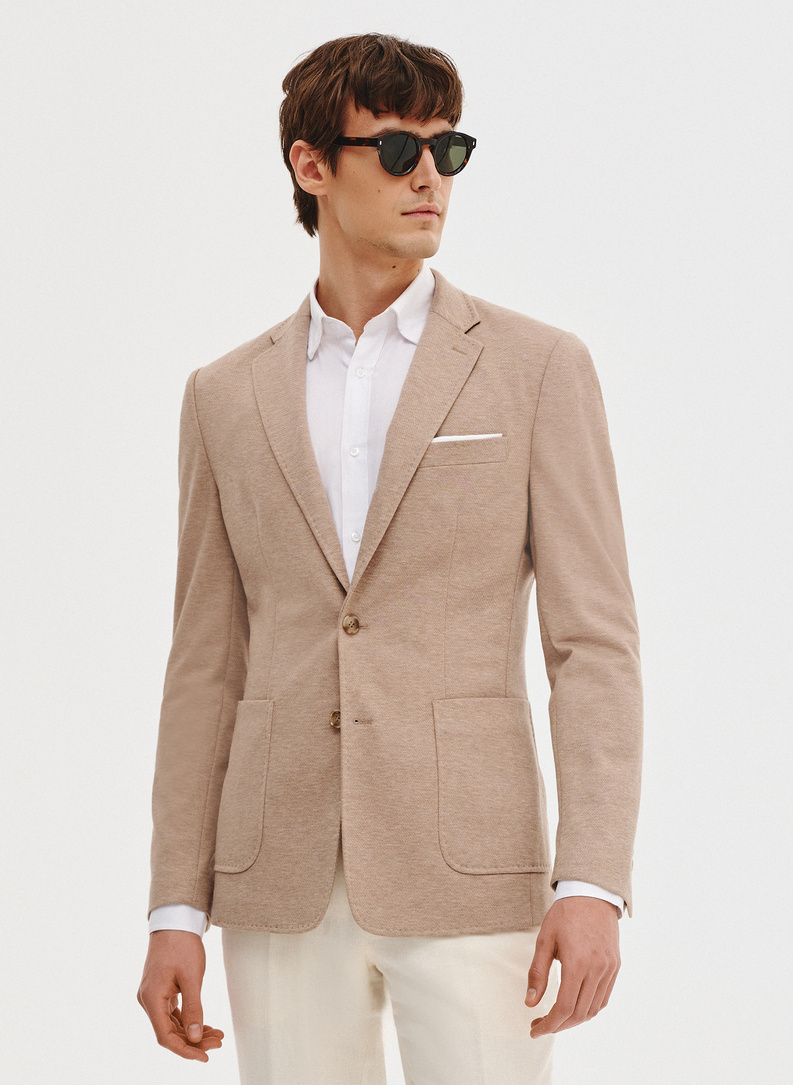 Dzianinowa marynarka w kolorze beżowym