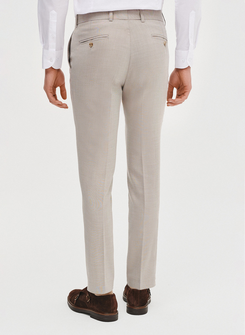 Spodnie garniturowe w kolorze beżowym