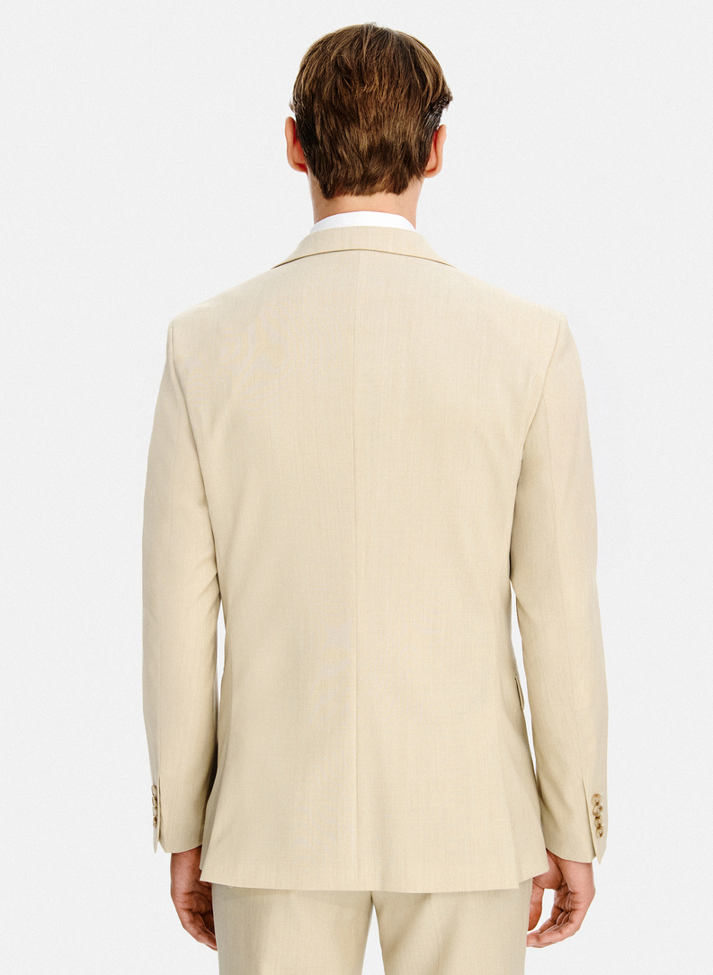 Beżowy wełniany garnitur męski