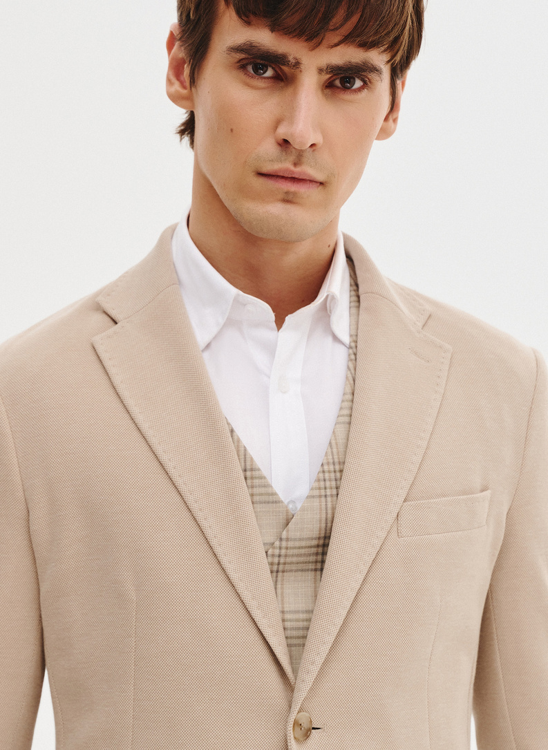 Beżowa marynarka z dzianiny