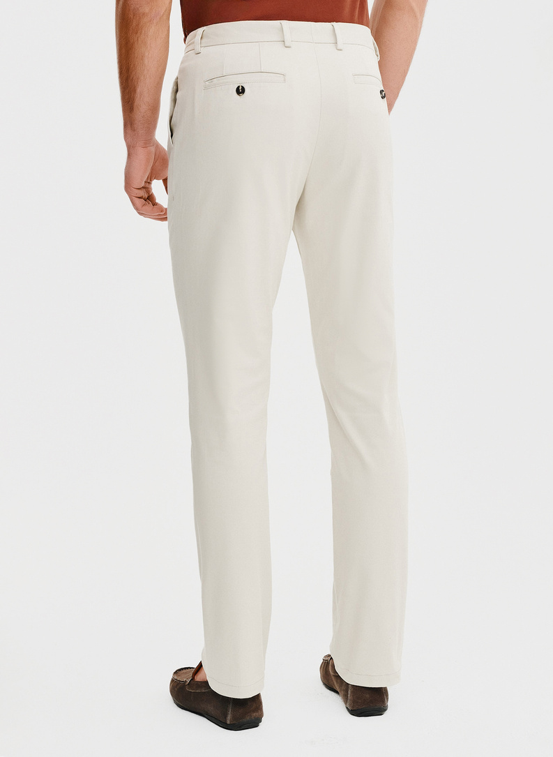 Beżowe spodnie z zaszewkami